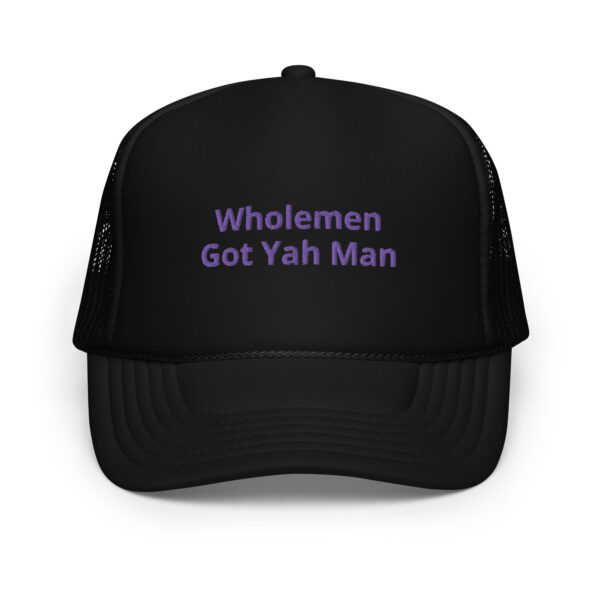 A black hat with the words " wholemen got yah man ".