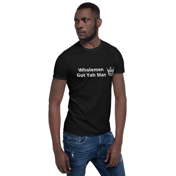 A man wearing a black t-shirt with the words " whatever, just trash man ".