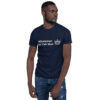 A man wearing a t-shirt with the words " whatever you turn mean " on it.