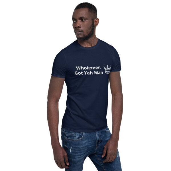 A man wearing a t-shirt with the words " whisdemen, not fish men ".